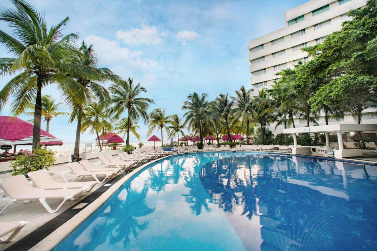 Hôtel Oasis Palm à Cancún Extérieur photo